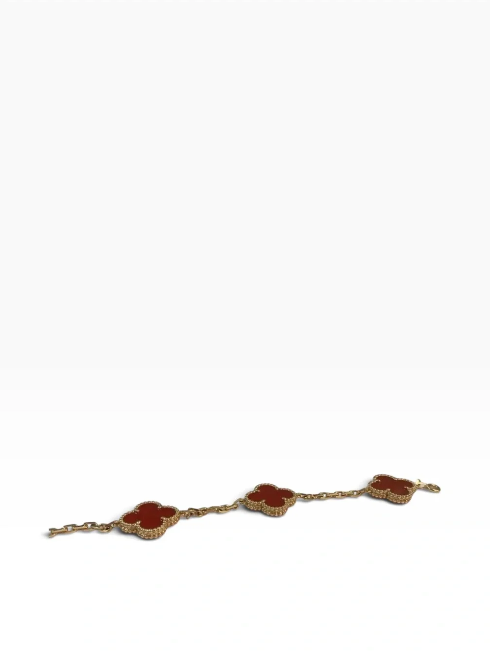 Van Cleef & Arpels Gold Bracelet with Deep Red Alhambra Motifs
